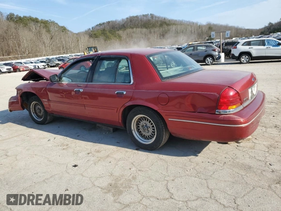 2001 Ford Crown Victoria LX z VIN 2FAFP74W41X205147, wystawiony jako Copart lot #46240035 z przebiegiem 65 495 mil mil oraz Szkoda całkowita • Salvage title. Historia ofert i sprzedaży dostępna na DreamBid. Obrazek 2.