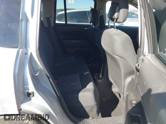 2011 Jeep Compass Latitude with VIN 1J4NT1FBXBD138744, listed as a IAAI auction lot 40740652 with 151,721 mi miles. Bid and sale history available at carsss.com. Image 8.