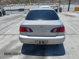 2000 Toyota Corolla VE with VIN 1NXBR12E5YZ369711, listed as a IAAI auction lot 42550174 with 273,785 mi miles and . Bid and sale history available at DreamBid. Image 17.