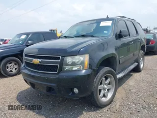 2014 Chevrolet Tahoe LT with VIN 1GNSCBE08ER193058, listed as a IAAI auction lot 42382232 with 228,749 mi miles and . Bid and sale history available at DreamBid. Image 6.