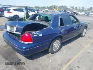2005 Ford Police Interceptor with VIN 2FAHP71W05X148383, listed as a IAAI auction lot 41769026 with 147,587 mi miles and . Bid and sale history available at DreamBid. Image 4.