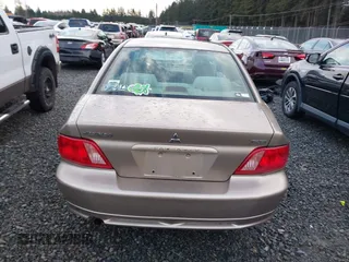 2002 Mitsubishi Galant ES with VIN 4A3AA46G42E142612, listed as a IAAI auction lot 41493433 with 106,960 mi miles. Bid and sale history available at carsss.com. Image 16.