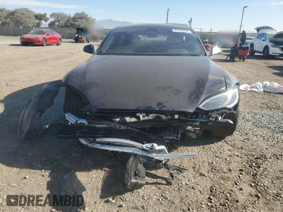 2024 Tesla Model S z VIN 5YJSA1E57RF545269, wystawiony jako Copart lot #87419784 z przebiegiem Nie podano mil oraz Szkoda całkowita • Salvage title. Historia ofert i sprzedaży dostępna na DreamBid. Obrazek 5.