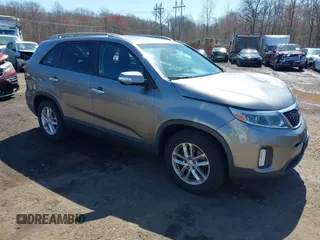 2015 Kia Sorento LX with VIN 5XYKT4A60FG606279, listed as a IAAI auction lot 41972303 with 123,033 mi miles. Bid and sale history available at carsss.com. Image 1.