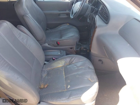 1999 Ford Windstar Wagon SEL with VIN 2FMDA5347XBC57509, listed as a IAAI auction lot 42036951 with 175,478 mi miles. Bid and sale history available at carsss.com. Image 5.