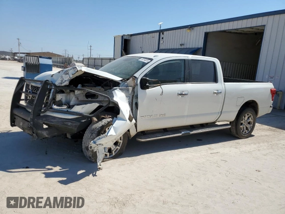 2016 Nissan Titan XD PRO-4X with VIN 1N6BA1F41GN510616, listed as a Copart auction lot 76314474 with 167,093 mi miles and Salvage Title. Bid and sale history available at carsss.com. Image 1.