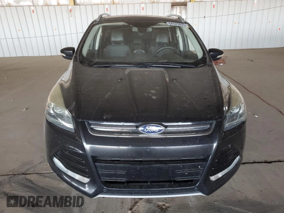 2015 Ford Escape Titanium with VIN 1FMCU0J91FUA17918, listed as a Copart auction lot 64525025 with 130,095 mi miles and Salvage title. Bid and sale history available at DreamBid. Image 5.