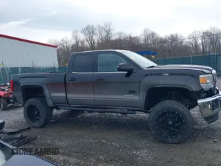 2015 GMC Sierra 1500 SLE z VIN 1GTV2UEC1FZ321141, wystawiony jako IAAI lot #41814049 z przebiegiem 91 173 mil mil oraz . Historia ofert i sprzedaży dostępna na DreamBid. Obrazek 14.