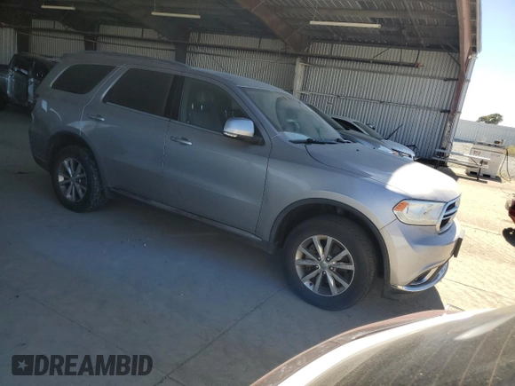 2014 Dodge Durango Limited with VIN 1C4RDJDG6EC592017, listed as a Copart auction lot 61428975 with 141,992 mi miles and Clean title. Bid and sale history available at DreamBid. Image 4.