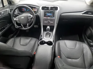 2016 Ford Fusion Energi Titanium with VIN 3FA6P0SUXGR320562, listed as a Copart auction lot 52647485 with 73,931 mi miles and Salvage Title. Bid and sale history available at carsss.com. Image 8.