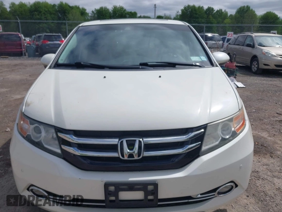 2015 Honda Odyssey Touring Elite с VIN 5FNRL5H91FB012330, выставлен на аукционе IAAI как лот 42307107 с пробегом 152 087 миль миль и . История ставок и продаж доступна на DreamBid. Изображение 13.
