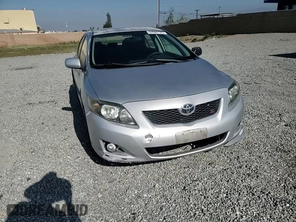2010 Toyota Corolla z VIN 1NXBU4EE2AZ380585, wystawiony jako Copart lot #57024125 z przebiegiem 175 334 mil mil oraz Szkoda całkowita • Salvage title. Historia ofert i sprzedaży dostępna na DreamBid. Obrazek 13.