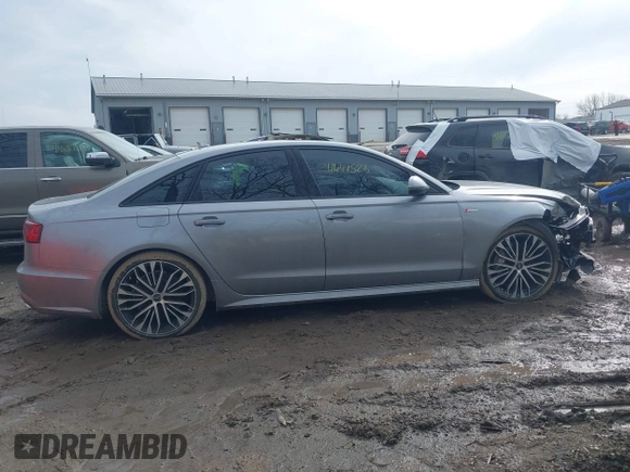 2017 Audi A6 Premium Plus z VIN WAUF2AFC7HN007745, wystawiony jako IAAI lot #41647523 z przebiegiem 119 837 mil mil oraz . Historia ofert i sprzedaży dostępna na DreamBid. Obrazek 13.
