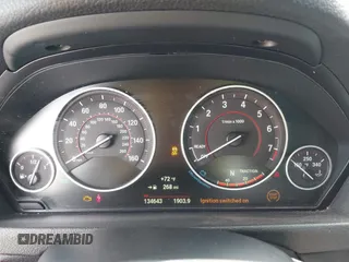 2015 BMW 3 Series 328i xDrive with VIN WBA3B3C57FJ985025, listed as a IAAI auction lot 42140398 with 134,643 mi miles and . Bid and sale history available at DreamBid. Image 7.