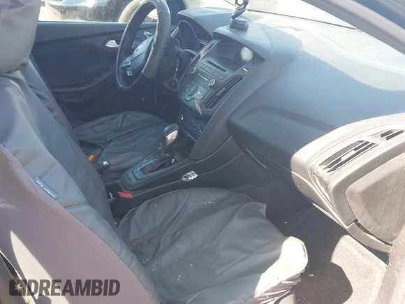 2017 Ford Focus SE with VIN 1FADP3F22HL341553, listed as a IAAI auction lot 42305588 with 165,016 mi miles and . Bid and sale history available at DreamBid. Image 5.