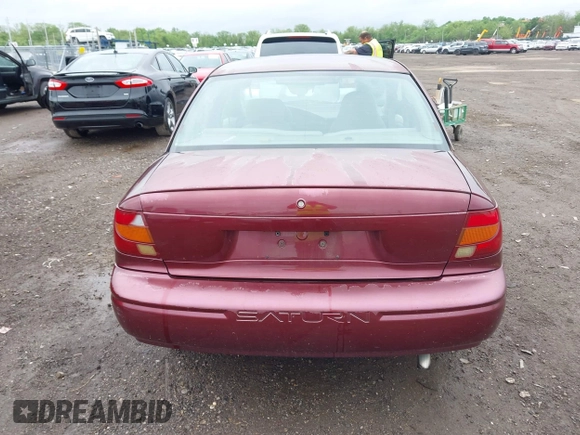 2001 Saturn SL z VIN 1G8ZG52821Z290428, wystawiony jako IAAI lot #42204275 z przebiegiem 171 478 mil mil oraz . Historia ofert i sprzedaży dostępna na DreamBid. Obrazek 16.