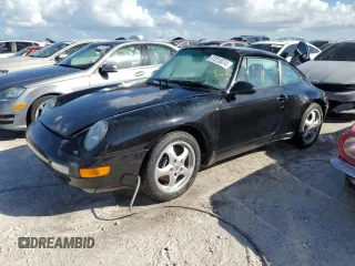 1995 Porsche 911 Carrera with VIN WP0AA2990SS323244, listed as a Copart auction lot 77215074 with 0 mi miles and Non Repairable. Bid and sale history available at carsss.com. Image 1.