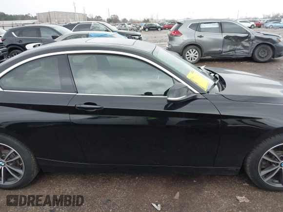 2018 BMW 2 Series 230i with VIN WBA2J1C50JVD09751, listed as a IAAI auction lot 41440752 with 71,700 mi miles. Bid and sale history available at carsss.com. Image 14.