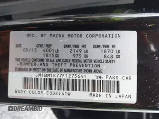 2015 Mazda 3 i Sport with VIN JM1BM1K77F1275641, listed as a IAAI auction lot 41582759 with 105,520 mi miles and . Bid and sale history available at DreamBid. Image 9.