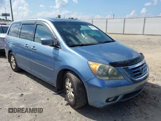2010 Honda Odyssey EX-L z VIN 5FNRL3H77AB017544, wystawiony jako IAAI lot #42824064 z przebiegiem 265 922 mil mil oraz . Historia ofert i sprzedaży dostępna na DreamBid. Obrazek 1.