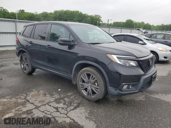 2021 Honda Passport EX-L z VIN 5FNYF8H50MB004444, wystawiony jako Copart lot #56404505 z przebiegiem 77 547 mil mil oraz Szkoda całkowita • Salvage title. Historia ofert i sprzedaży dostępna na DreamBid. Obrazek 4.