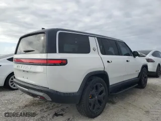2023 Rivian R1S Adventure with VIN 7PDSGABAXPN004854, listed as a Copart auction lot 75369664 with 0 mi miles and Salvage Title. Bid and sale history available at carsss.com. Image 3.