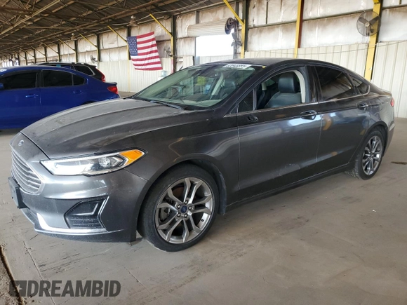 2020 Ford Fusion SEL z VIN 3FA6P0CD3LR131180, wystawiony jako Copart lot #63843355 z przebiegiem 146 705 mil mil oraz Czysty tytuł • Clean title. Historia ofert i sprzedaży dostępna na DreamBid. Obrazek 1.