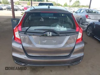2020 Honda Fit LX z VIN 3HGGK5H42LM728368, wystawiony jako IAAI lot #42271576 z przebiegiem 266 363 mil mil oraz . Historia ofert i sprzedaży dostępna na DreamBid. Obrazek 16.