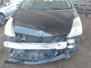 2007 Toyota Prius with VIN JTDKB20U277597719, listed as a IAAI auction lot 42153731 with 148,174 mi miles and . Bid and sale history available at DreamBid. Image 6.