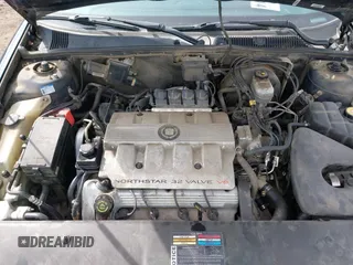 1999 Cadillac Seville Touring STS z VIN 1G6KY5493XU913994, wystawiony jako IAAI lot #41780695 z przebiegiem 60 375 mil mil oraz . Historia ofert i sprzedaży dostępna na DreamBid. Obrazek 10.