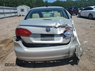 2012 Volkswagen Jetta TDI w/Premium & Nav z VIN 3VWLL7AJ7CM011404, wystawiony jako Copart lot #61536925 z przebiegiem 133 183 mil mil oraz Szkoda całkowita • Salvage title. Historia ofert i sprzedaży dostępna na DreamBid. Obrazek 6.