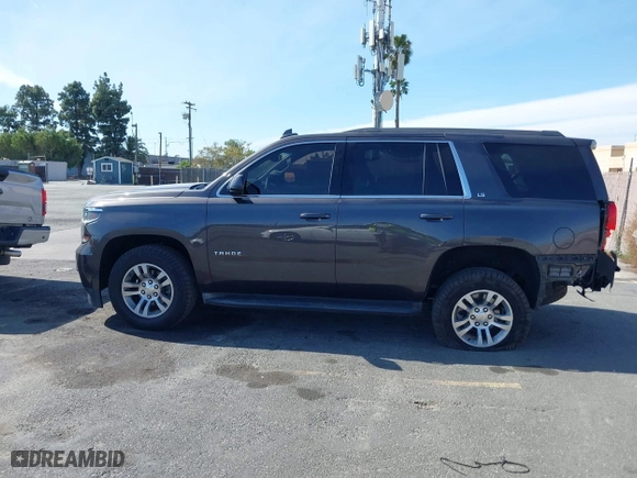 2016 Chevrolet Tahoe LS with VIN 1GNSCAKC2GR110249, listed as a IAAI auction lot 41583619 with 65,542 mi miles. Bid and sale history available at carsss.com. Image 14.