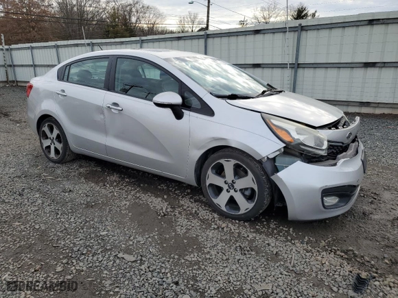 2012 Kia Rio SX with VIN KNADN4A37C6070838, listed as a Copart auction lot 87348684 with 105403 miles and Salvage Title. Bid and sale history available at carsss.com. Image 4.
