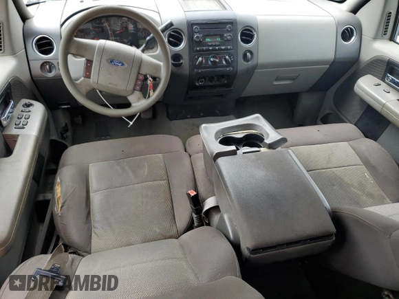 2005 Ford F-150 XLT with VIN 1FTPX02585KF08330, listed as a Copart auction lot 58403995 with 179,426 mi miles and Salvage title. Bid and sale history available at DreamBid. Image 8.