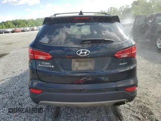 2015 Hyundai Santa Fe z VIN 5XYZU3LB7FG287608, wystawiony jako Copart lot #54870005 z przebiegiem 245 483 mil mil oraz Szkoda całkowita • Salvage title. Historia ofert i sprzedaży dostępna na DreamBid. Obrazek 6.