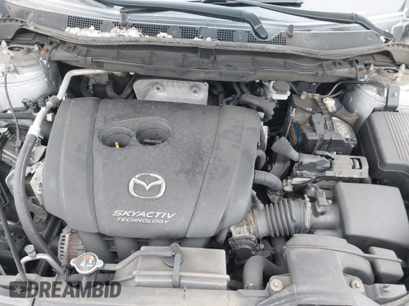 2016 Mazda CX-5 Sport z VIN JM3KE4BY1G0711602, wystawiony jako IAAI lot #42537627 z przebiegiem Nie podano mil oraz . Historia ofert i sprzedaży dostępna na DreamBid. Obrazek 10.