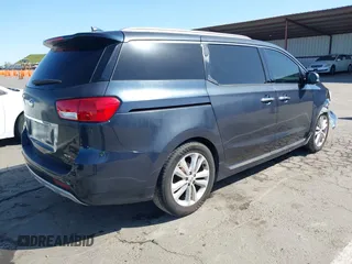 2016 Kia Sedona SX-L with VIN KNDME5C15G6083811, listed as a IAAI auction lot 41932863 with 124,218 mi miles. Bid and sale history available at carsss.com. Image 4.