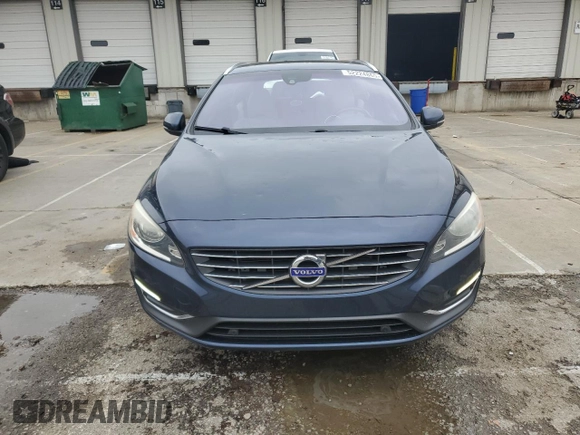 2015 Volvo V60 T5 Drive-E Premier Plus z VIN YV140MEC6F1213575, wystawiony jako Copart lot #52224865 z przebiegiem 78 702 mil mil oraz Szkoda całkowita • Salvage title. Historia ofert i sprzedaży dostępna na DreamBid. Obrazek 5.