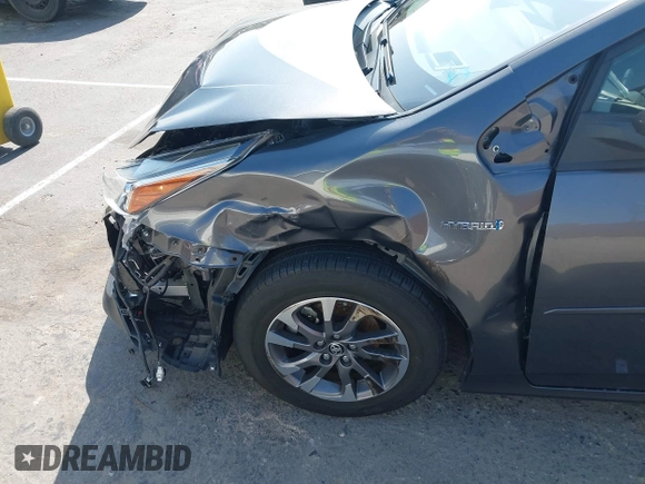 2021 Toyota Prius L Eco with VIN JTDKAMFU4M3144985, listed as a IAAI auction lot 42443957 with 20,816 mi miles and . Bid and sale history available at DreamBid. Image 17.