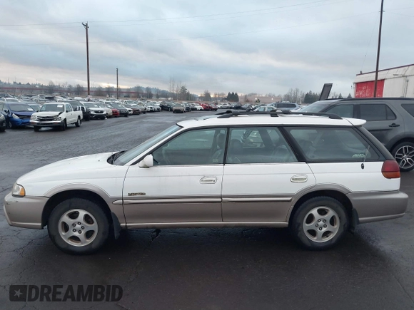 1999 Subaru Legacy Outback z VIN 4S3BG6852X7659898, wystawiony jako IAAI lot #41298823 z przebiegiem 138 834 mil mil oraz . Historia ofert i sprzedaży dostępna na DreamBid. Obrazek 13.