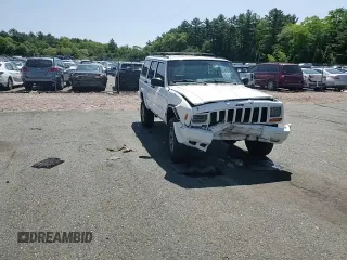 1998 Jeep Cherokee Sport with VIN 1J4FJ68S8WL116368, listed as a Copart auction lot 59228735 with 113,546 mi miles and Salvage title. Bid and sale history available at DreamBid. Image 14.