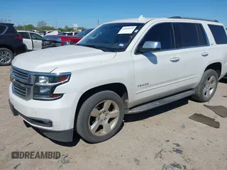 2016 Chevrolet Tahoe LTZ with VIN 1GNSCCKC1GR404754, listed as a IAAI auction lot 41831879 with 139,681 mi miles and . Bid and sale history available at DreamBid. Image 17.