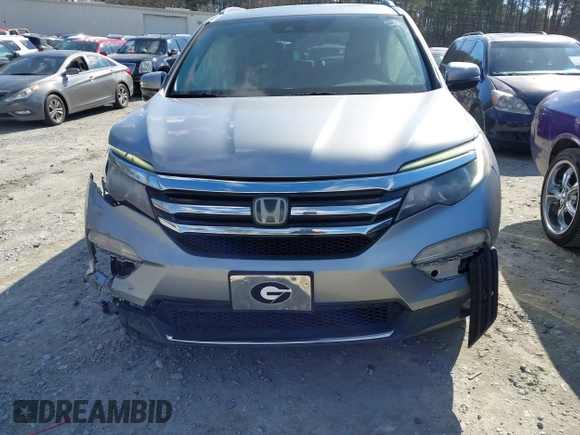 2017 Honda Pilot Touring with VIN 5FNYF6H94HB006873, listed as a IAAI auction lot 41618529 with 154,689 mi miles. Bid and sale history available at carsss.com. Image 12.
