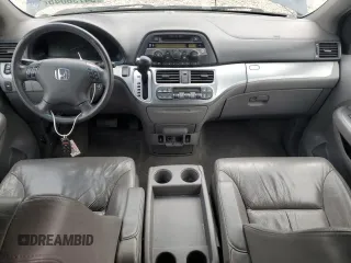 2009 Honda Odyssey EX-L with VIN 5FNRL38629B409446, listed as a Copart auction lot 54736045 with 176,229 mi miles and Salvage Title. Bid and sale history available at DreamBid. Image 8.