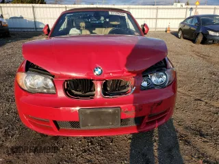 2010 BMW 1 Series 128i with VIN WBAUL7C54AVJ77712, listed as a Copart auction lot 83158294 with Not provided miles and Salvage title. Bid and sale history available at DreamBid. Image 5.