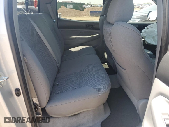 2006 Toyota Tacoma with VIN 5TELU42N76Z283409, listed as a Copart auction lot 61391785 with 77,799 mi miles and Salvage title. Bid and sale history available at DreamBid. Image 10.