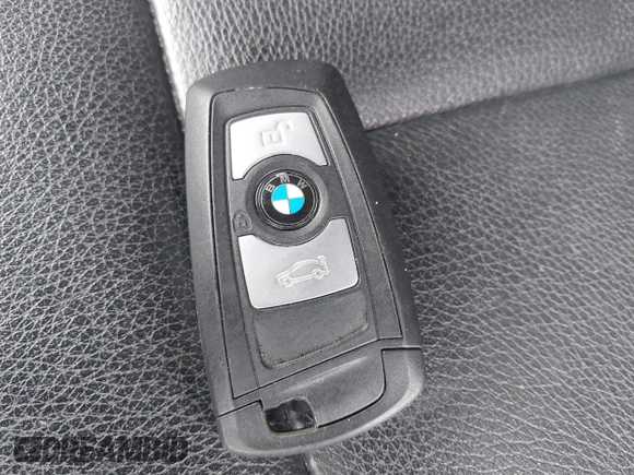 2013 BMW 3 Series 328i xDrive with VIN WBA3B5C5XDF597184, listed as a IAAI auction lot 42060785 with 205,559 mi miles. Bid and sale history available at carsss.com. Image 11.