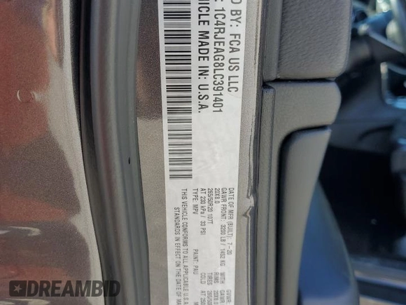 2020 Jeep Grand Cherokee Laredo E with VIN 1C4RJEAG8LC391401, listed as a Copart auction lot 80630874 with 122,083 mi miles and Salvage title. Bid and sale history available at DreamBid. Image 13.