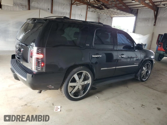 2010 Chevrolet Tahoe LTZ with VIN 1GNUKCE05AR236038, listed as a Copart auction lot 63033425 with 132,236 mi miles and Salvage title. Bid and sale history available at DreamBid. Image 3.