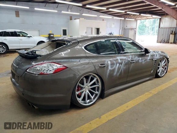 2010 Porsche Panamera Turbo z VIN WP0AC2A73AL090361, wystawiony jako Copart lot #59045905 z przebiegiem Nie podano mil oraz Czysty tytuł • Clean title. Historia ofert i sprzedaży dostępna na DreamBid. Obrazek 3.
